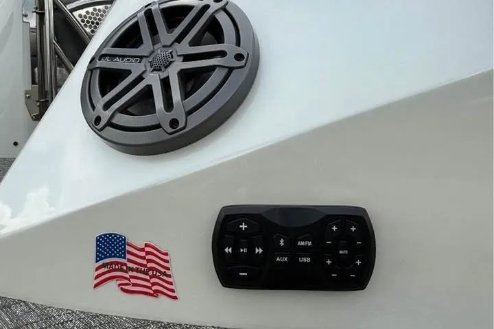 Slide: The Image of 2019 Berkshire 29 Sport RFX-DC boat audio system with speaker and control panel. - 17