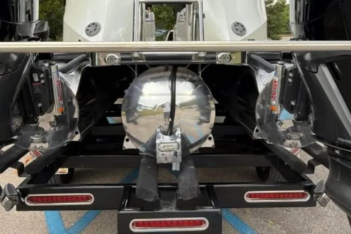 Slide: The Image of Rear view of a 2019 Berkshire 29 Sport RFX-DC boat with dual engines. - 19