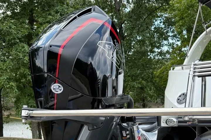Slide: The Image of 2019 Berkshire 29 Sport RFX-DC boat engine with sleek black and red design. - 20