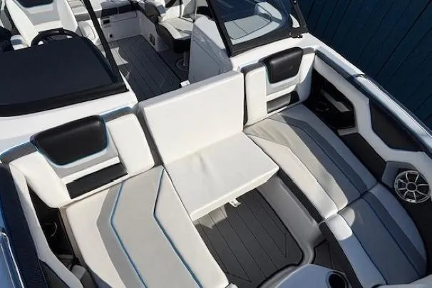 Slide: The Image of 2021 Yamaha Boats 212XD interior with sleek seating and modern design. - 11