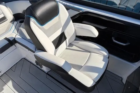 Slide: The Image of 2021 Yamaha Boats 212XD interior with sleek, modern seating design. - 19