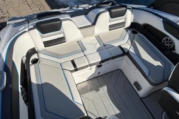 Slide: The Image of 2021 Yamaha Boats 212XD interior with sleek seating and modern design. - 24