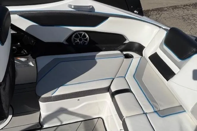 Slide: The Image of 2021 Yamaha Boats 212XD interior with sleek seating and modern design. - 27