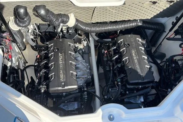 Slide: The Image of Twin high-output engines in a 2021 Yamaha Boats 212XD, showcasing powerful marine performance. - 31