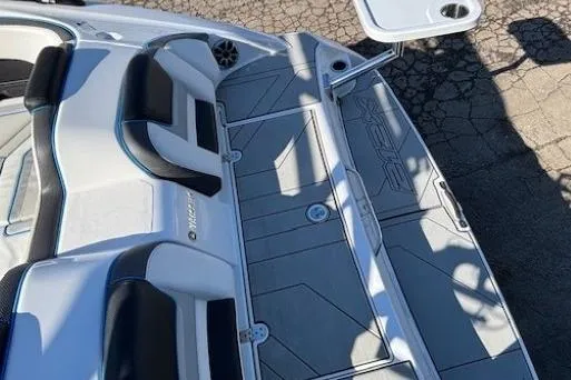 Slide: The Image of 2021 Yamaha Boats 212XD interior with seating and table, showcasing modern design. - 32