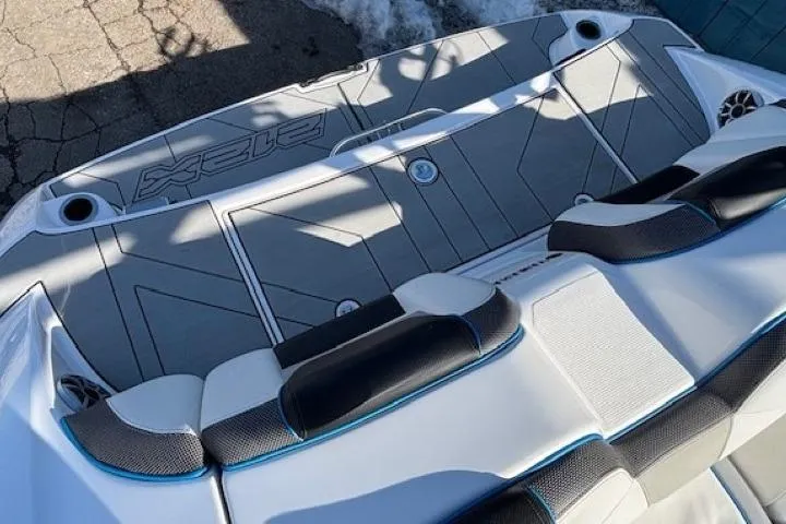 Slide: The Image of 2021 Yamaha Boats 212XD swim platform with cushioned seating and sleek design. - 33