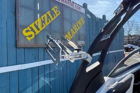 Slide: The Image of 2021 Yamaha Boats 212XD at Sizzle Marine dealership, featuring a sleek wakeboard tower. - 35