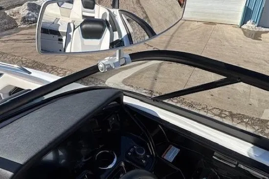 Slide: The Image of Interior view of 2021 Yamaha Boats 212XD, featuring dashboard and rearview mirror. - 37