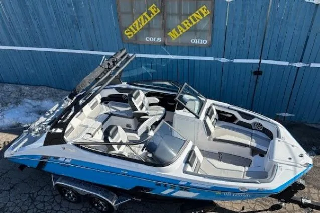 Slide: The Image of 2021 Yamaha Boats 212XD in blue, parked at Sizzle Marine, Ohio. - 5