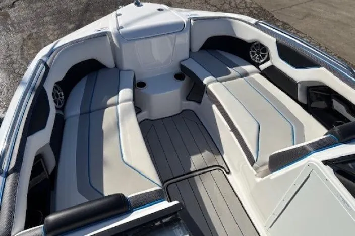 Slide: The Image of 2021 Yamaha Boats 212XD interior with spacious seating and modern design. - 8