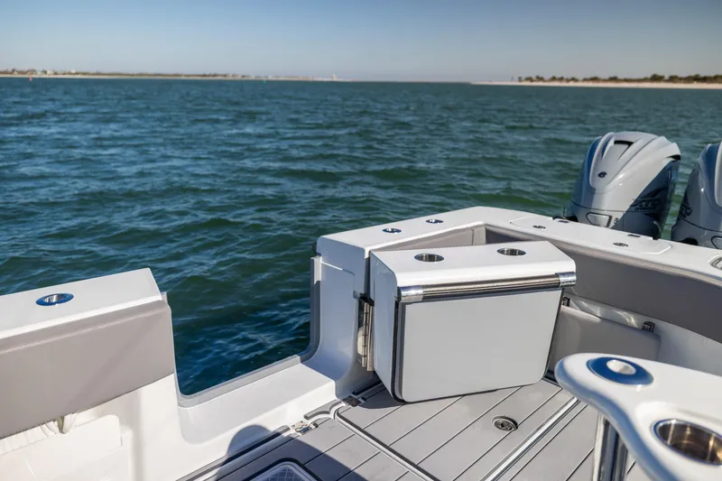 Slide: The Image of 2024 Freeman 47 boat deck with ocean view and dual engines. - 17