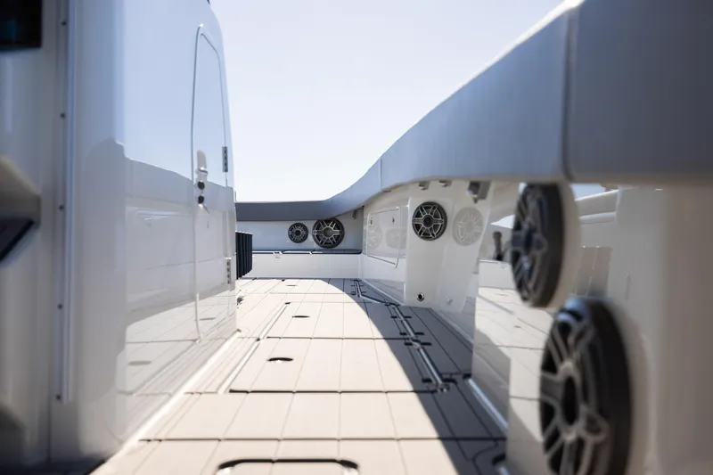 Slide: The Image of 2024 Freeman 47 boat deck with sleek design and modern audio system. - 34