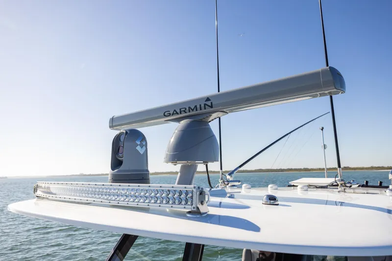 Slide: The Image of 2024 Freeman 47 boat with Garmin radar system on a sunny day. - 35