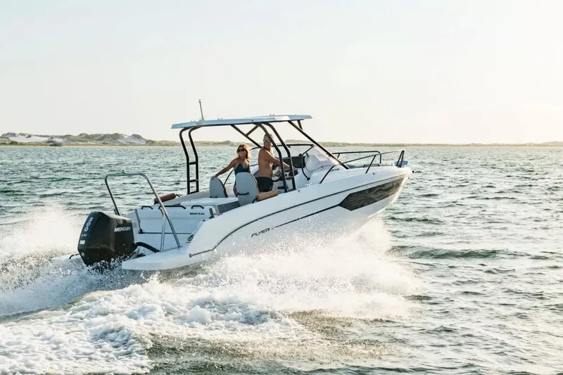 The Image of 2026 Beneteau Flyer 8 SUNdeck cruising on open water, showcasing sleek design and performance. - 0