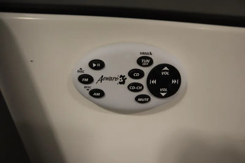 Slide: The Image of Audio control panel in a 2008 Moomba Outback V boat, featuring various function buttons. - 24