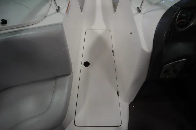 Slide: The Image of 2008 Moomba Outback V interior with storage compartment and seating. - 31