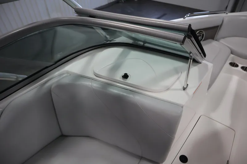 Slide: The Image of 2008 Moomba Outback V boat interior with white seating and windshield. - 33