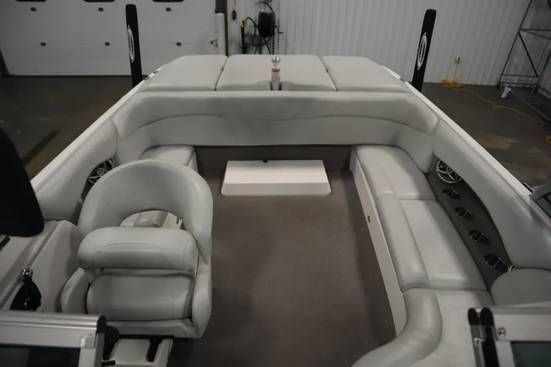 Slide: The Image of 2008 Moomba Outback V boat interior with gray seating and carpeted floor. - 35