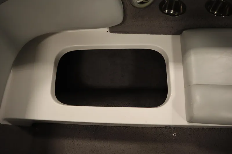 Slide: The Image of 2008 Moomba Outback V boat interior storage compartment with gray upholstery. - 39