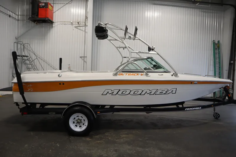Slide: The Image of 2008 Moomba Outback V boat on trailer in indoor storage facility. - 4