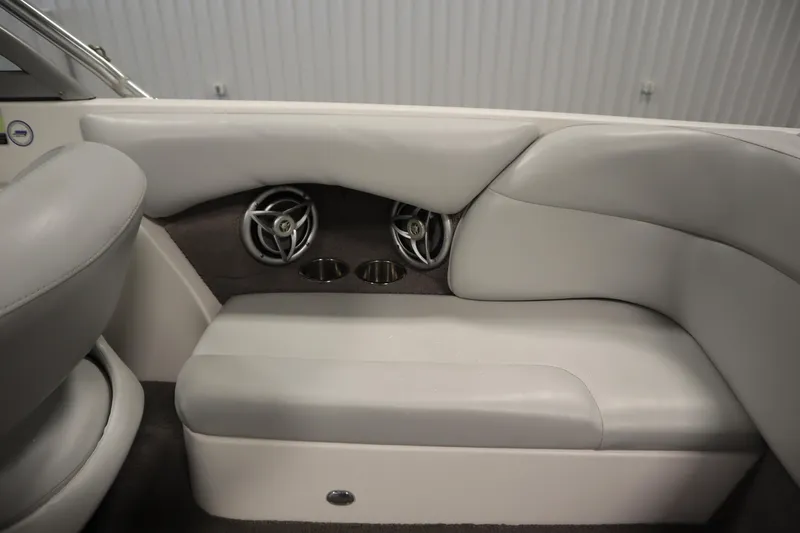 Slide: The Image of 2008 Moomba Outback V interior with gray seating and built-in speakers. - 40