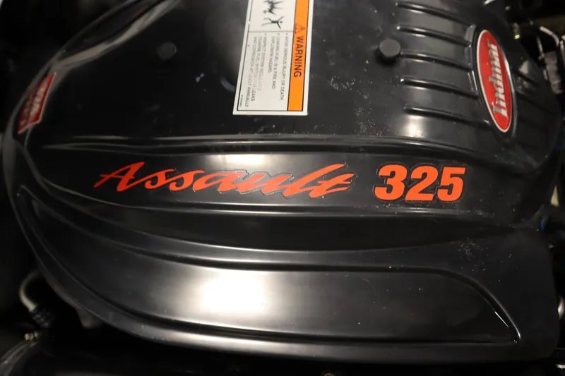 Slide: The Image of 2008 Moomba Outback V engine cover with "Assault 325" branding. - 43