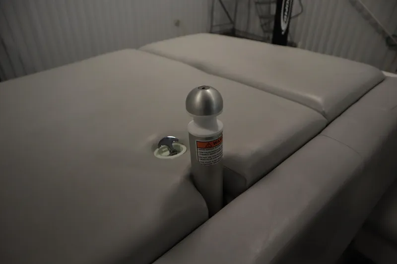 Slide: The Image of 2008 Moomba Outback V boat interior with gray upholstery and metal fixture. - 44