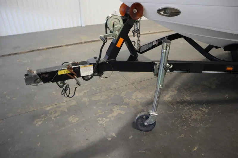 Slide: The Image of Trailer hitch of a 2008 Moomba Outback V boat in a garage setting. - 48