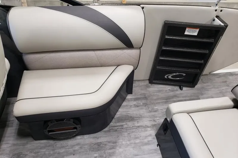 Slide: The Image of 2021 Crest Continental 250 SLS interior with stylish seating and modern flooring. - 12