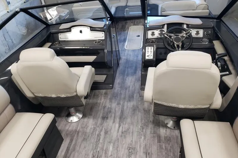 Slide: The Image of Interior of 2021 Crest Continental 250 SLS boat with modern seating and controls. - 15