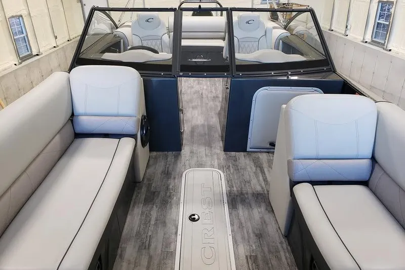 Slide: The Image of 2021 Crest Continental 250 SLS boat interior with luxurious seating and modern design. - 16