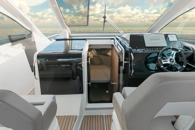 Slide: The Image of 2026 Beneteau Flyer 10 Sport Top cockpit with modern helm and luxurious seating. - 11