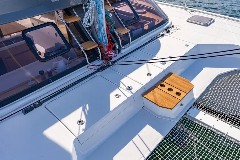 Slide: The Image of Deck of 2020 Nautitech 40 Open catamaran with ropes and wooden accents. - 11