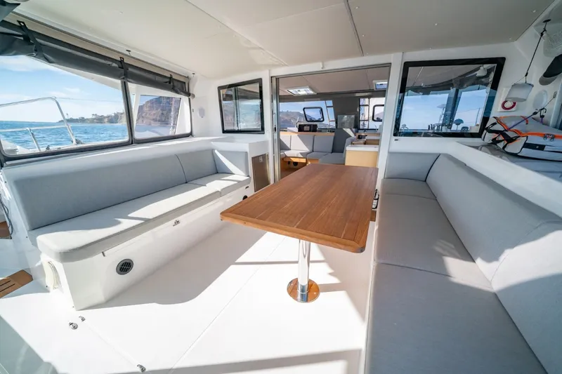 Slide: The Image of Spacious interior of 2020 Nautitech 40 Open catamaran with modern seating and ocean view. - 15