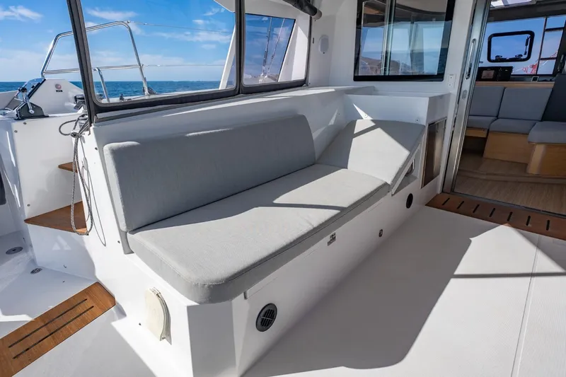 Slide: The Image of Modern Nautitech 40 Open 2020 yacht interior with comfortable seating and ocean view. - 16