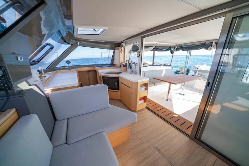 Slide: The Image of Interior of 2020 Nautitech 40 Open catamaran with modern design and ocean view. - 17