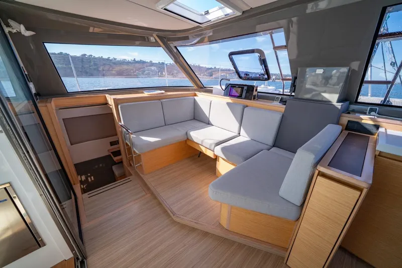 Slide: The Image of Luxurious interior of 2020 Nautitech 40 Open catamaran with modern seating and panoramic windows. - 20