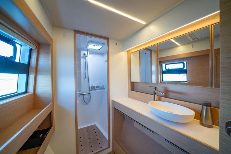 Slide: The Image of Modern bathroom interior of 2020 Nautitech 40 Open yacht, featuring sleek design and ample lighting. - 30