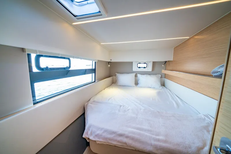 Slide: The Image of Cozy bedroom interior of 2020 Nautitech 40 Open catamaran with modern design and natural light. - 34