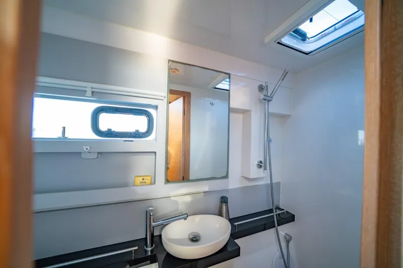 Slide: The Image of Modern bathroom in 2020 Nautitech 40 Open yacht with sleek fixtures and natural light. - 35