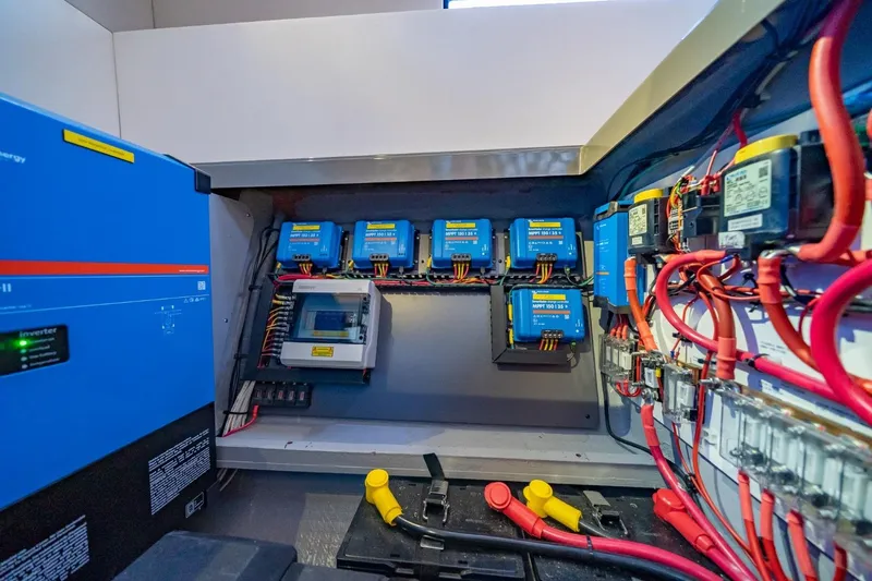 Slide: The Image of Electrical system of 2020 Nautitech 40 Open catamaran, featuring inverters and wiring. - 38