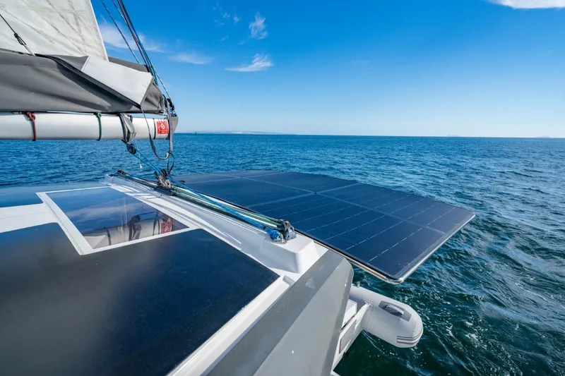 Slide: The Image of 2020 Nautitech 40 Open catamaran with solar panels sailing on open sea. - 9