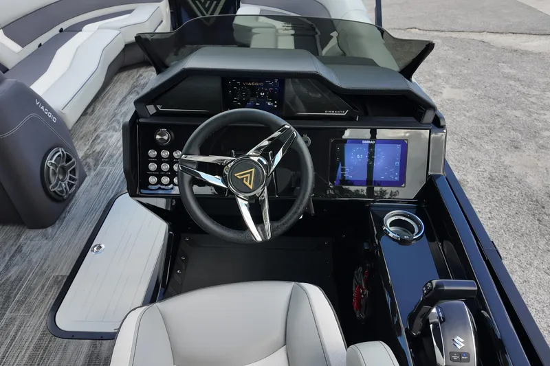 Slide: The Image of 2026 Viaggio Diamante 24S boat dashboard with modern controls and sleek design. - 9