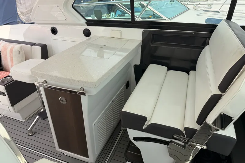 Slide: The Image of 2018 Monterey 360 Sport Coupe interior with sleek seating and modern countertop design. - 12