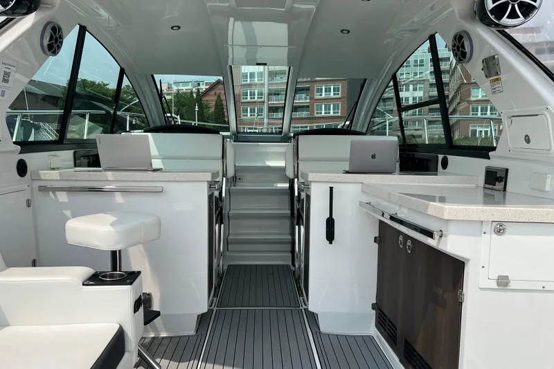 Slide: The Image of Interior of a 2018 Monterey 360 Sport Coupe yacht with modern amenities and sleek design. - 13