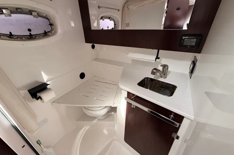 Slide: The Image of 2018 Monterey 360 Sport Coupe bathroom with sink, mirror, and compact design. - 35
