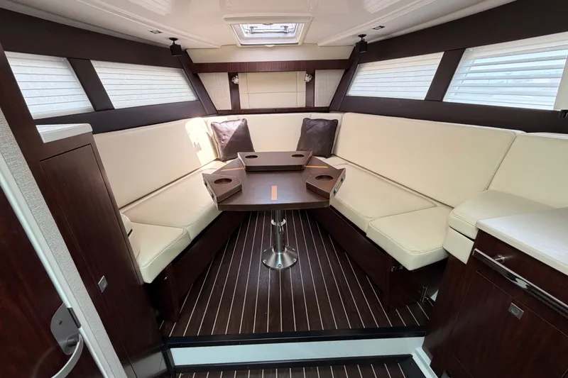 Slide: The Image of Luxurious interior of 2018 Monterey 360 Sport Coupe with elegant seating and modern design. - 25