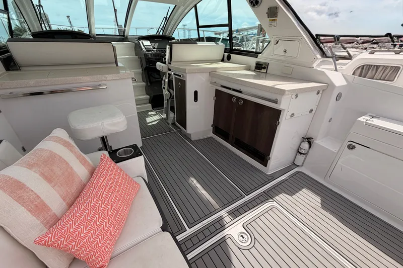 Slide: The Image of Luxurious interior of 2018 Monterey 360 Sport Coupe yacht with modern seating and sleek design. - 10