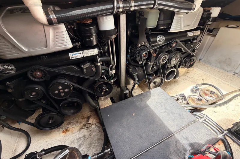 Slide: The Image of Engine compartment of a 2018 Monterey 360 Sport Coupe, showcasing dual engines and components. - 38