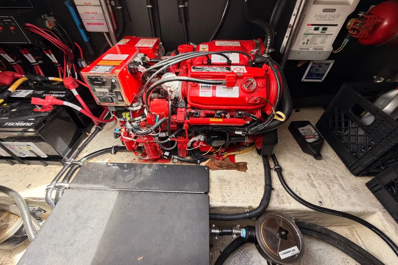 Slide: The Image of Engine compartment of a 2018 Monterey 360 Sport Coupe with red machinery and wiring. - 39